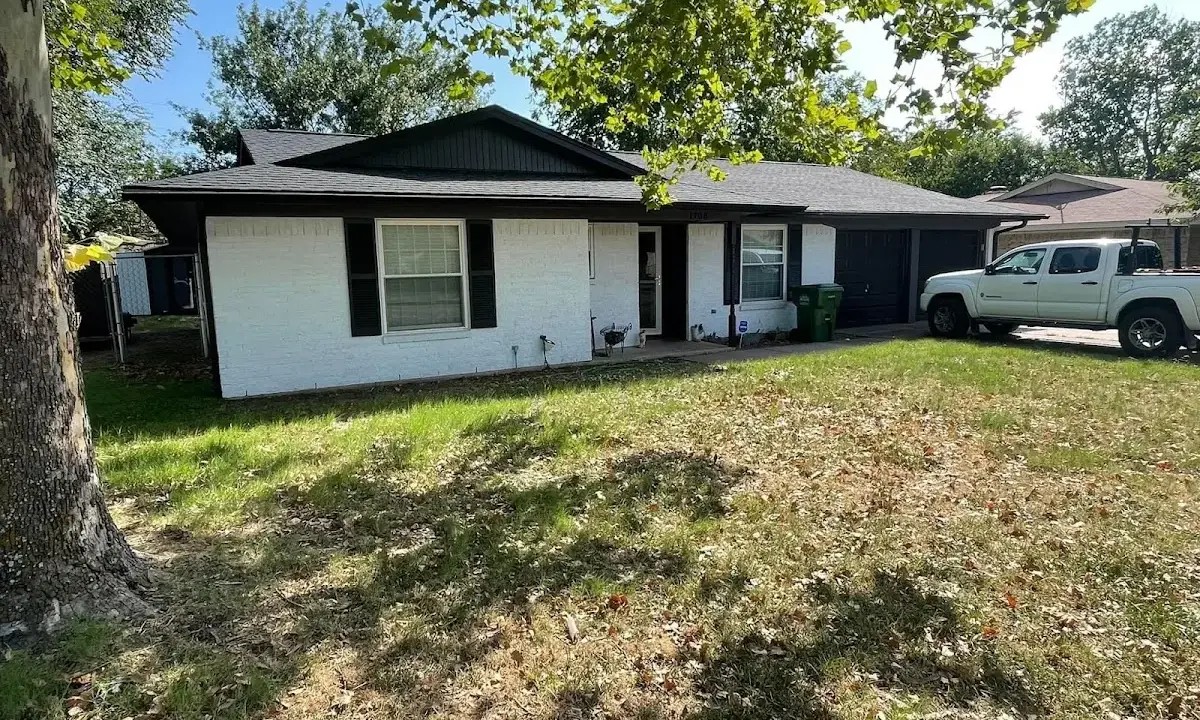 Professional roofing crew working on a residential roof in Salmon Creek